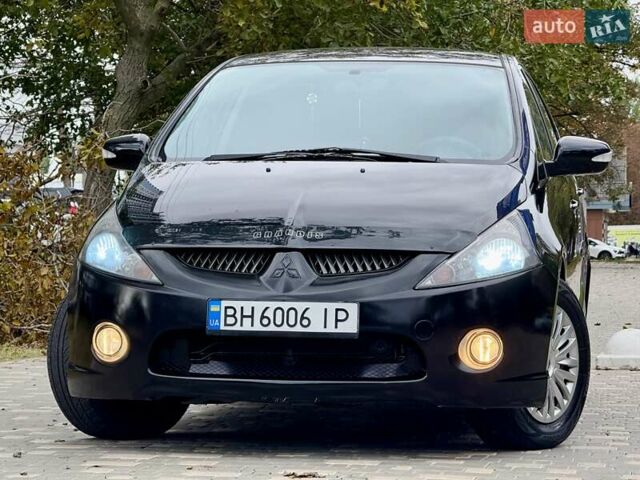 Черный Мицубиси Грандис, объемом двигателя 2.4 л и пробегом 323 тыс. км за 5999 $, фото 9 на Automoto.ua