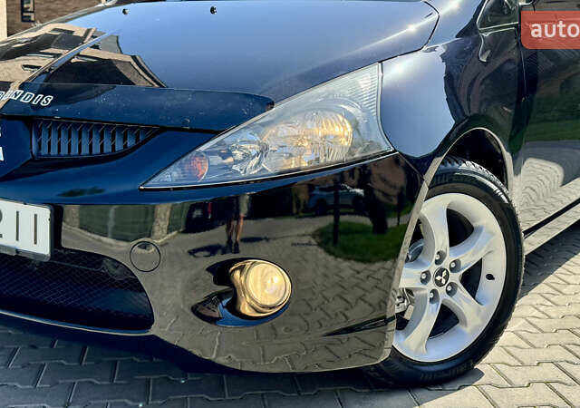 Черный Мицубиси Грандис, объемом двигателя 2.4 л и пробегом 121 тыс. км за 6450 $, фото 31 на Automoto.ua