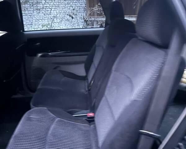 Чорний Міцубісі Грандіс, об'ємом двигуна 2.4 л та пробігом 270 тис. км за 3950 $, фото 13 на Automoto.ua