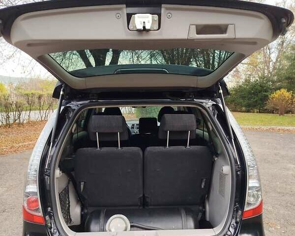 Черный Мицубиси Грандис, объемом двигателя 2.38 л и пробегом 215 тыс. км за 5900 $, фото 16 на Automoto.ua