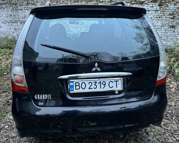 Чорний Міцубісі Грандіс, об'ємом двигуна 2.4 л та пробігом 270 тис. км за 3950 $, фото 6 на Automoto.ua