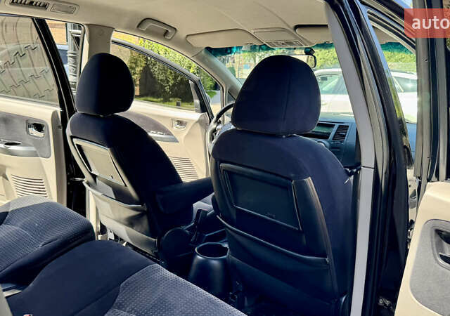 Черный Мицубиси Грандис, объемом двигателя 2.4 л и пробегом 121 тыс. км за 6450 $, фото 70 на Automoto.ua