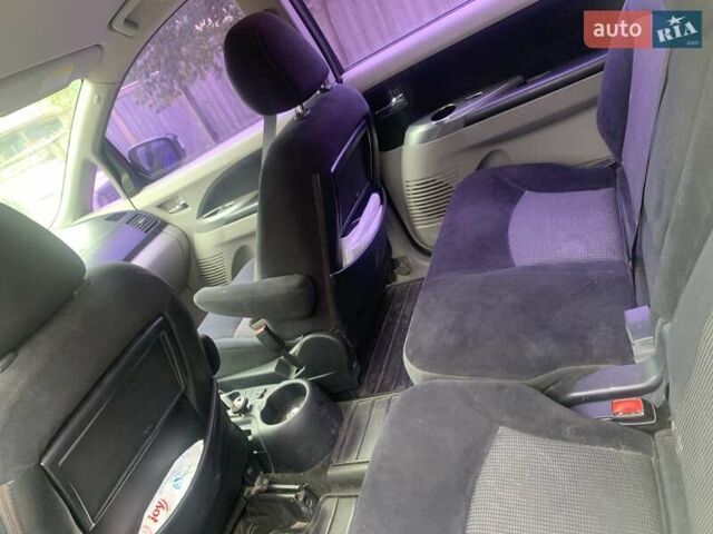 Черный Мицубиси Грандис, объемом двигателя 2.4 л и пробегом 209 тыс. км за 5500 $, фото 5 на Automoto.ua