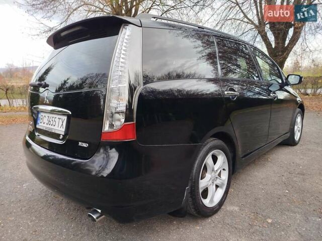 Черный Мицубиси Грандис, объемом двигателя 2.38 л и пробегом 215 тыс. км за 5900 $, фото 6 на Automoto.ua