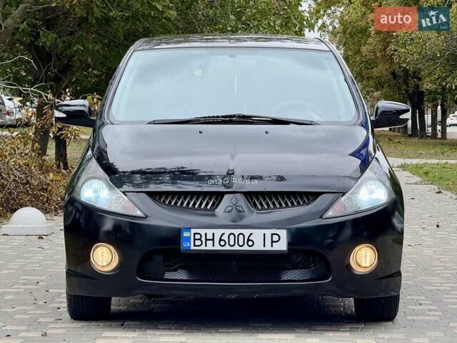 Черный Мицубиси Грандис, объемом двигателя 2.4 л и пробегом 323 тыс. км за 5999 $, фото 1 на Automoto.ua