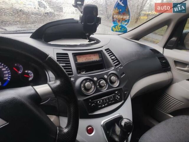 Черный Мицубиси Грандис, объемом двигателя 2.4 л и пробегом 315 тыс. км за 5800 $, фото 12 на Automoto.ua