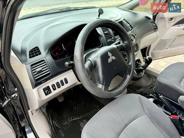Черный Мицубиси Грандис, объемом двигателя 2.4 л и пробегом 323 тыс. км за 5999 $, фото 37 на Automoto.ua