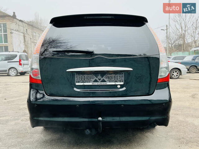 Черный Мицубиси Грандис, объемом двигателя 2.4 л и пробегом 188 тыс. км за 6800 $, фото 6 на Automoto.ua