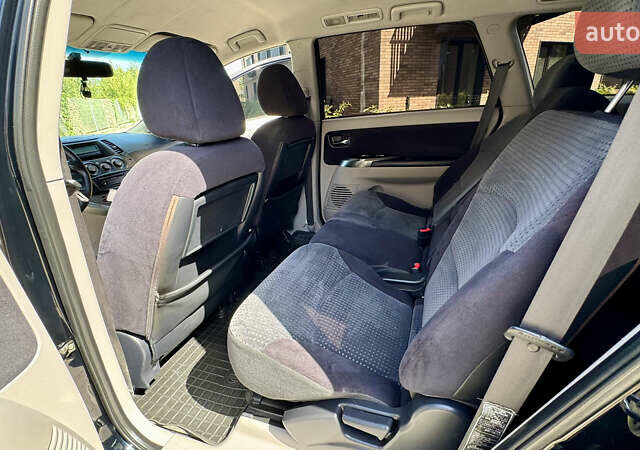 Черный Мицубиси Грандис, объемом двигателя 2.4 л и пробегом 121 тыс. км за 6450 $, фото 56 на Automoto.ua