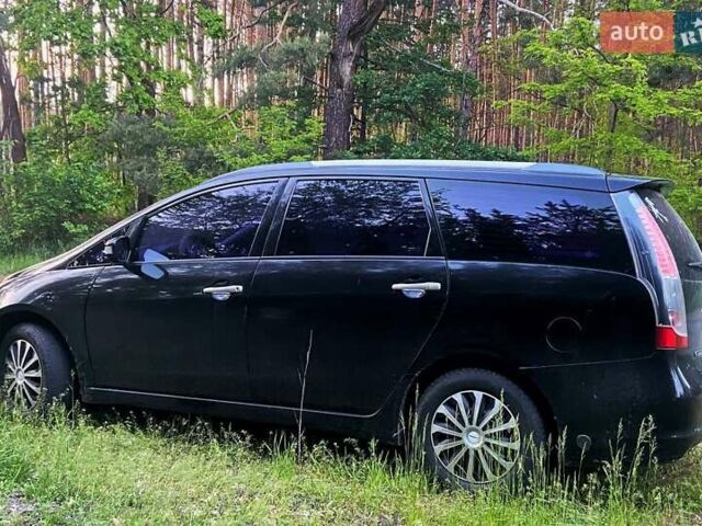 Черный Мицубиси Грандис, объемом двигателя 2.4 л и пробегом 209 тыс. км за 5500 $, фото 1 на Automoto.ua