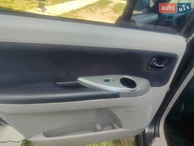 Черный Мицубиси Грандис, объемом двигателя 2.4 л и пробегом 130 тыс. км за 7200 $, фото 3 на Automoto.ua