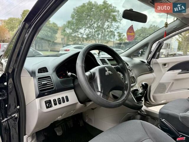 Черный Мицубиси Грандис, объемом двигателя 2.4 л и пробегом 323 тыс. км за 5999 $, фото 38 на Automoto.ua