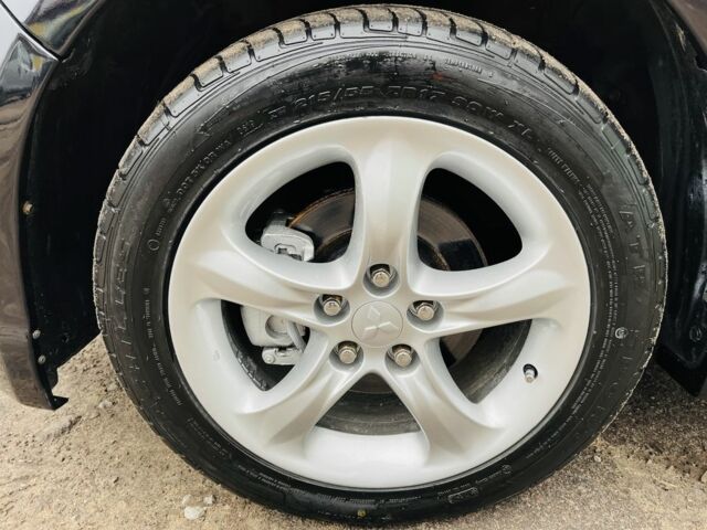 Чорний Міцубісі Грандіс, об'ємом двигуна 2.4 л та пробігом 188 тис. км за 6800 $, фото 13 на Automoto.ua