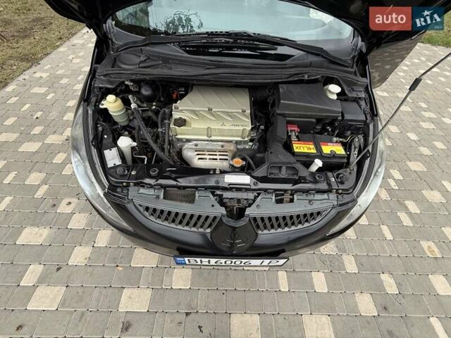 Черный Мицубиси Грандис, объемом двигателя 2.4 л и пробегом 323 тыс. км за 5999 $, фото 71 на Automoto.ua