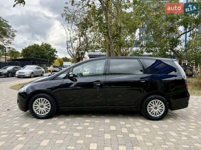 Черный Мицубиси Грандис, объемом двигателя 2.4 л и пробегом 323 тыс. км за 5999 $, фото 2 на Automoto.ua