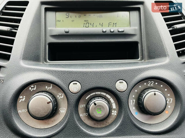 Черный Мицубиси Грандис, объемом двигателя 2.4 л и пробегом 188 тыс. км за 6800 $, фото 45 на Automoto.ua