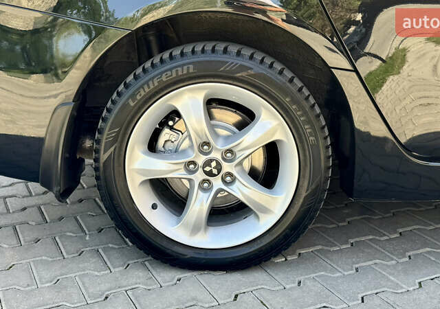 Черный Мицубиси Грандис, объемом двигателя 2.4 л и пробегом 121 тыс. км за 6450 $, фото 18 на Automoto.ua