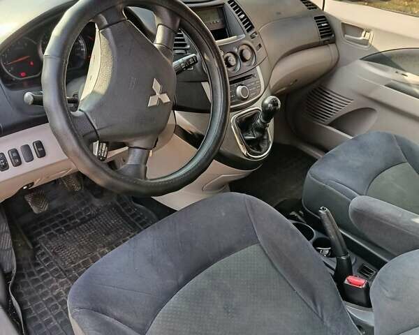 Черный Мицубиси Грандис, объемом двигателя 2 л и пробегом 249 тыс. км за 5350 $, фото 4 на Automoto.ua