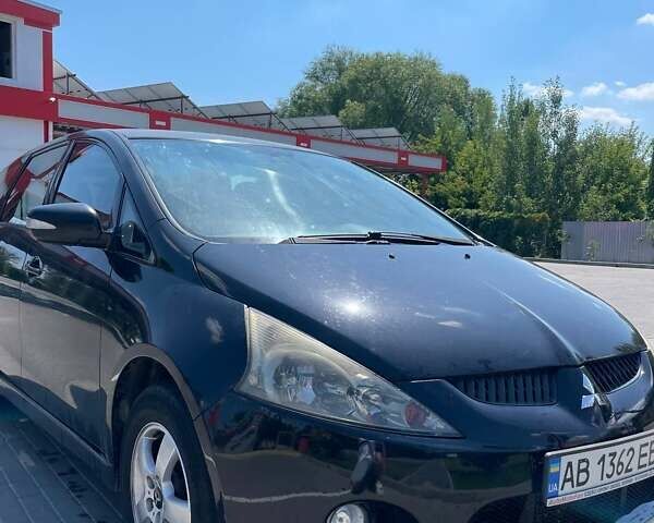 Черный Мицубиси Грандис, объемом двигателя 2 л и пробегом 228 тыс. км за 7600 $, фото 2 на Automoto.ua