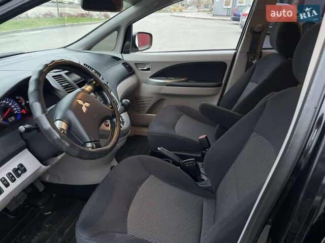 Чорний Міцубісі Грандіс, об'ємом двигуна 2.4 л та пробігом 144 тис. км за 9700 $, фото 10 на Automoto.ua