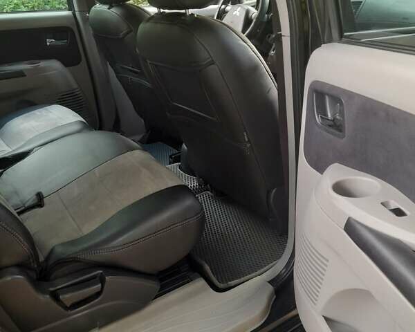 Чорний Міцубісі Грандіс, об'ємом двигуна 2 л та пробігом 290 тис. км за 6300 $, фото 1 на Automoto.ua