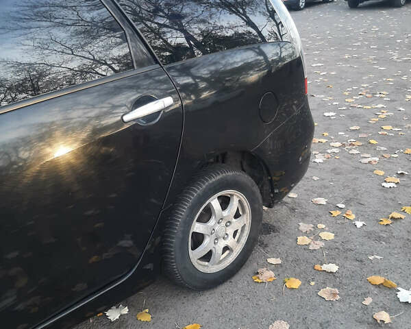 Чорний Міцубісі Грандіс, об'ємом двигуна 2.38 л та пробігом 240 тис. км за 7500 $, фото 9 на Automoto.ua