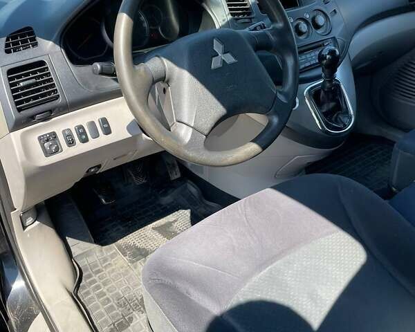 Черный Мицубиси Грандис, объемом двигателя 2 л и пробегом 228 тыс. км за 7600 $, фото 14 на Automoto.ua