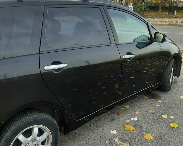 Чорний Міцубісі Грандіс, об'ємом двигуна 2.38 л та пробігом 240 тис. км за 7500 $, фото 2 на Automoto.ua