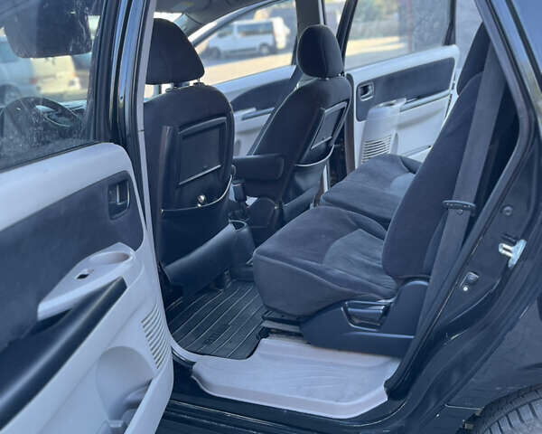 Черный Мицубиси Грандис, объемом двигателя 2.4 л и пробегом 290 тыс. км за 4600 $, фото 8 на Automoto.ua