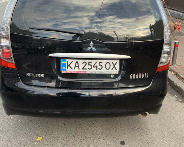 Чорний Міцубісі Грандіс, об'ємом двигуна 2.38 л та пробігом 190 тис. км за 6500 $, фото 8 на Automoto.ua