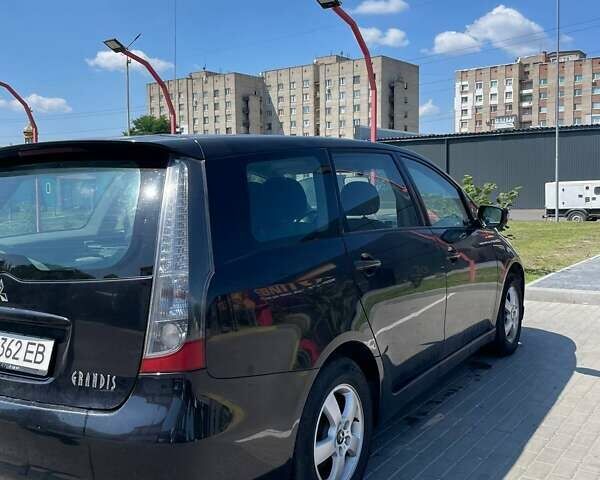 Черный Мицубиси Грандис, объемом двигателя 2 л и пробегом 228 тыс. км за 7600 $, фото 7 на Automoto.ua