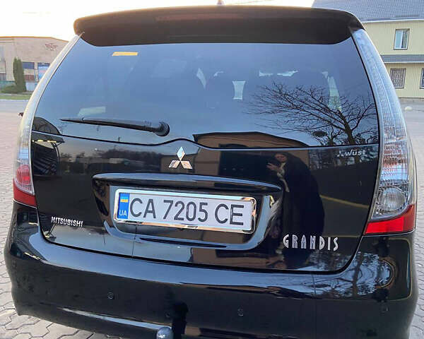 Черный Мицубиси Грандис, объемом двигателя 1.97 л и пробегом 377 тыс. км за 6999 $, фото 9 на Automoto.ua