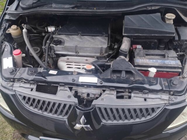 Черный Мицубиси Грандис, объемом двигателя 2.4 л и пробегом 340 тыс. км за 55000 $, фото 7 на Automoto.ua