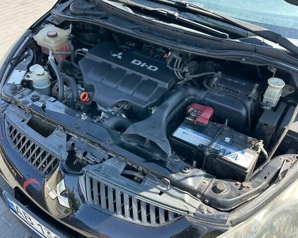 Черный Мицубиси Грандис, объемом двигателя 2 л и пробегом 228 тыс. км за 7600 $, фото 9 на Automoto.ua