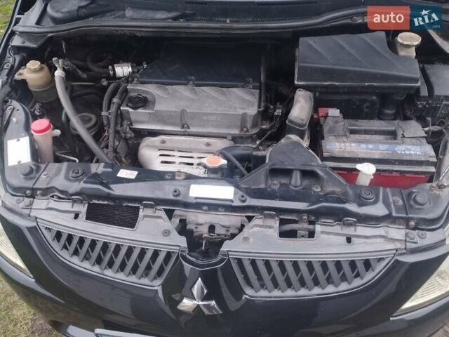 Черный Мицубиси Грандис, объемом двигателя 2.4 л и пробегом 340 тыс. км за 5500 $, фото 4 на Automoto.ua