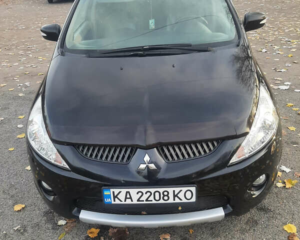 Чорний Міцубісі Грандіс, об'ємом двигуна 2.38 л та пробігом 240 тис. км за 7500 $, фото 7 на Automoto.ua