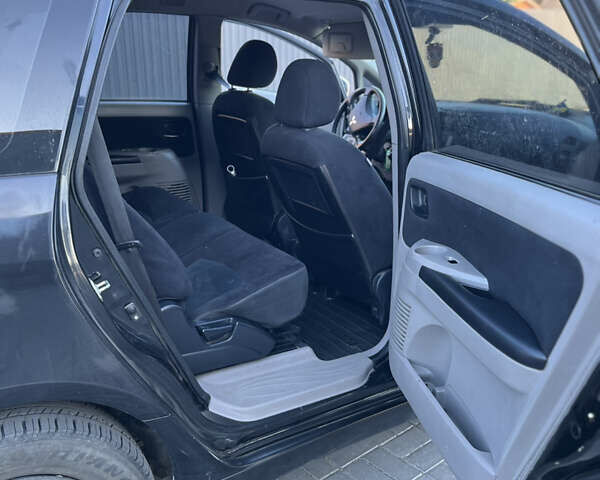 Черный Мицубиси Грандис, объемом двигателя 2.4 л и пробегом 290 тыс. км за 4600 $, фото 9 на Automoto.ua