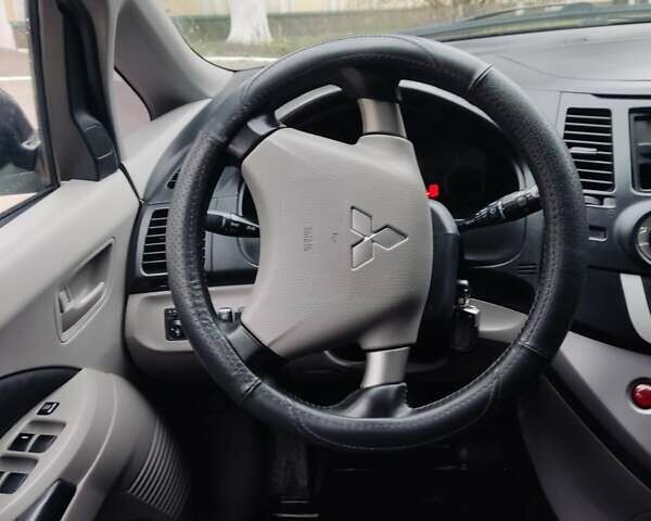 Чорний Міцубісі Грандіс, об'ємом двигуна 2.4 л та пробігом 235 тис. км за 5999 $, фото 31 на Automoto.ua