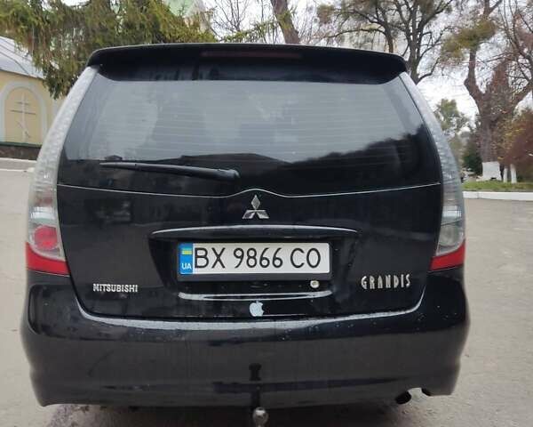 Чорний Міцубісі Грандіс, об'ємом двигуна 2.4 л та пробігом 235 тис. км за 5999 $, фото 17 на Automoto.ua