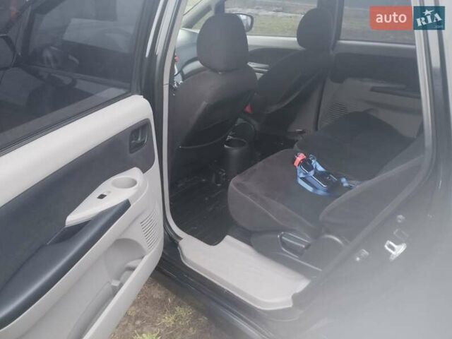 Черный Мицубиси Грандис, объемом двигателя 2.4 л и пробегом 340 тыс. км за 5500 $, фото 7 на Automoto.ua