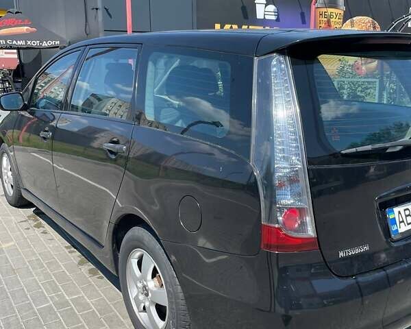 Черный Мицубиси Грандис, объемом двигателя 2 л и пробегом 228 тыс. км за 7600 $, фото 5 на Automoto.ua