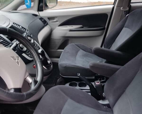 Чорний Міцубісі Грандіс, об'ємом двигуна 2.4 л та пробігом 235 тис. км за 5999 $, фото 26 на Automoto.ua