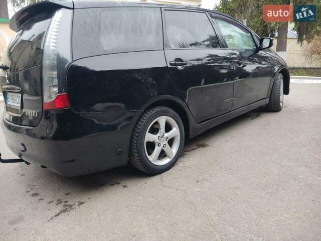Чорний Міцубісі Грандіс, об'ємом двигуна 2.4 л та пробігом 235 тис. км за 5999 $, фото 11 на Automoto.ua