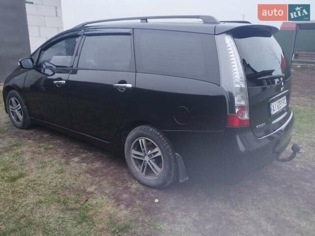 Черный Мицубиси Грандис, объемом двигателя 2.4 л и пробегом 340 тыс. км за 5500 $, фото 2 на Automoto.ua