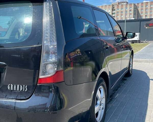 Черный Мицубиси Грандис, объемом двигателя 2 л и пробегом 228 тыс. км за 7600 $, фото 4 на Automoto.ua