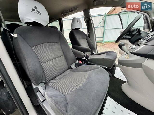 Черный Мицубиси Грандис, объемом двигателя 2.4 л и пробегом 185 тыс. км за 5899 $, фото 30 на Automoto.ua