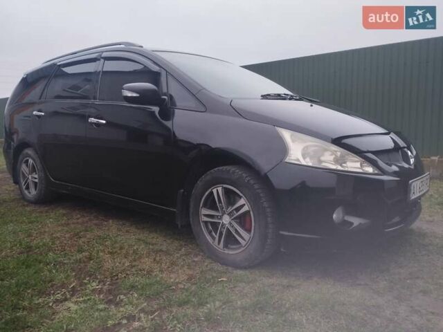 Черный Мицубиси Грандис, объемом двигателя 2.4 л и пробегом 340 тыс. км за 5500 $, фото 1 на Automoto.ua