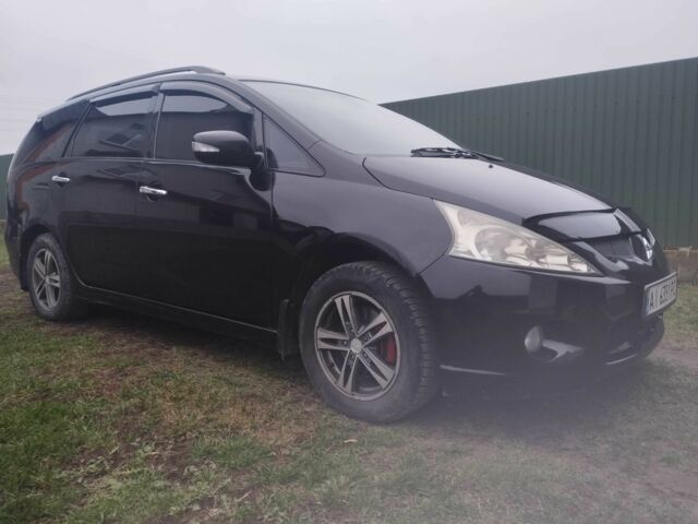 Черный Мицубиси Грандис, объемом двигателя 2.4 л и пробегом 340 тыс. км за 55000 $, фото 1 на Automoto.ua