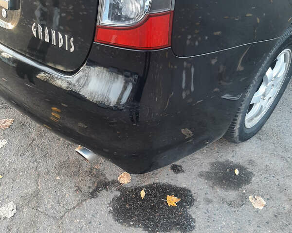 Чорний Міцубісі Грандіс, об'ємом двигуна 2.38 л та пробігом 240 тис. км за 7500 $, фото 3 на Automoto.ua