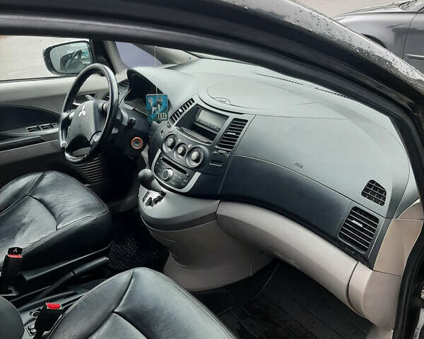 Чорний Міцубісі Грандіс, об'ємом двигуна 2.38 л та пробігом 240 тис. км за 7500 $, фото 14 на Automoto.ua